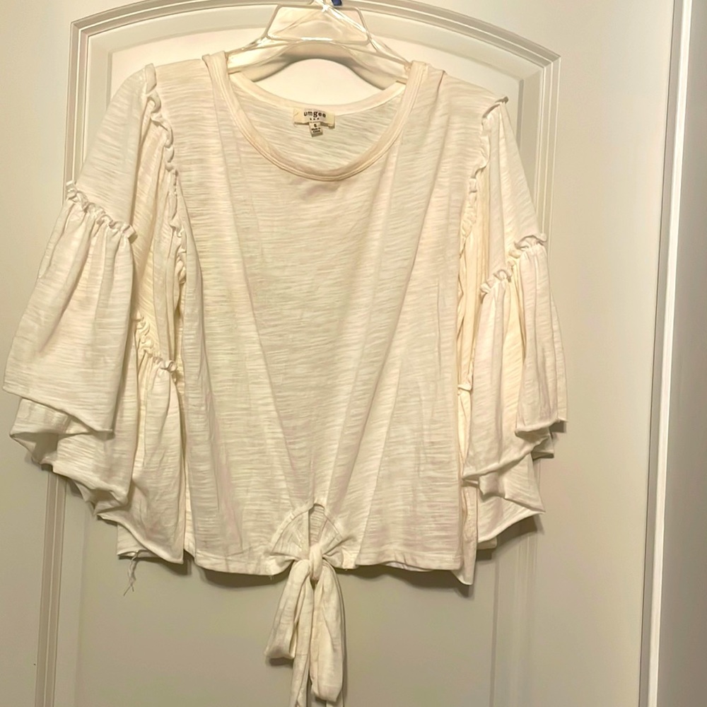 White small blouse. Full ruffled sleeves, front tie
